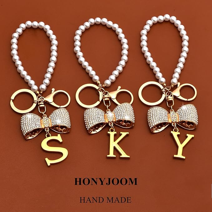 Gold Initial Keychain with Rhinestone Bow & Black Pom Pom, Cute Letter Bag Charm for Women Purse and Car Keys