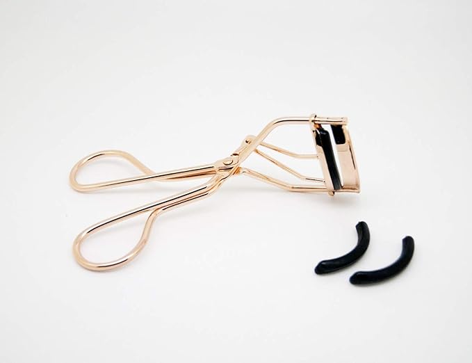 EMILYSTORES Professional Makeup Tool for Eyelashes with 2 Replacement Silicone Refill Pads Pinch Pain Free Metal Eyelash Curler 1PC, Golden Color