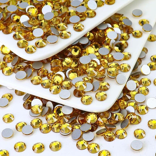 1440PCS SS3 Crystal Glass Flatback Rhinestones, Round Flat Back Crystal Gems for Nail Art and Craft Clothes, Glue Fix Diamond Stones Topaz Gold (1.3-1.4mm)