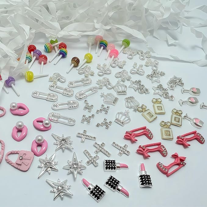 84 pcs 3D Sliver Pink Nail Charms Y2K Set Cute Nail Charms with Stars, Crowns, Crosses,Bins,Lollipops, Lips, Bottles, Cups, Perfume, Lipsticks, Bags, and Heels for Nail Art