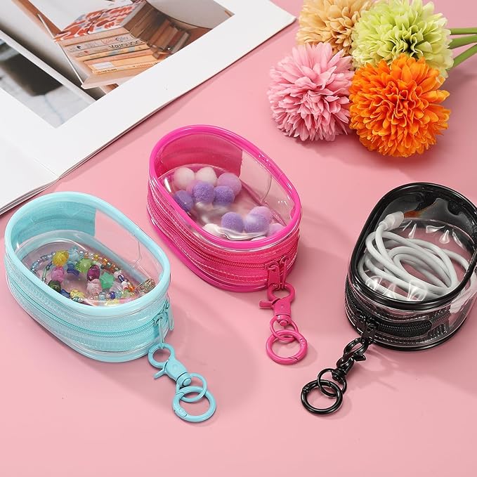 uxcell 4 Inch Clear Figure Display Bag, Mini Clear Pouch Waterproof Coin Pouch with Keychain and Pom Poms for Blind Box Doll Display (Round, Orange)