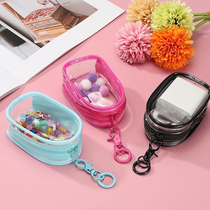 uxcell 4 Inch Clear Figure Display Bag, Mini Clear Pouch Waterproof Coin Pouch with Keychain and Pom Poms for Blind Box Doll Display (Oval, Black)